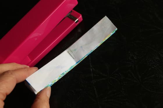 stapler and folded paper